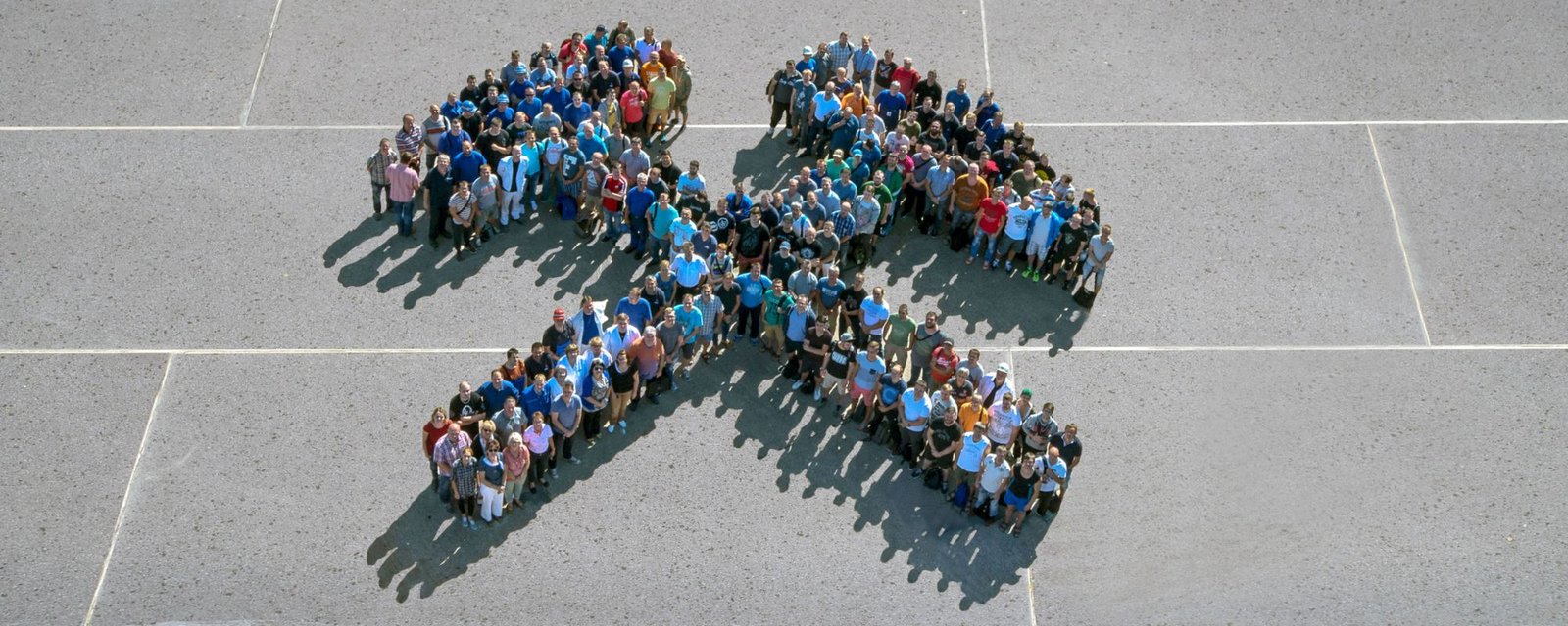 K+S employees forming the mining symbol